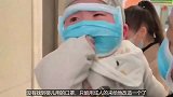 没有找到婴儿用的口罩，只能用成人的来给他改造一个了
