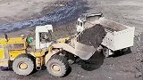 为什么重型装载机是露天煤炭装载运输开采有效工程机械 ？