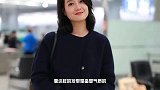 朱丹穿深蓝色呢大衣，搭阔腿裤走机场，过年回家这么穿显气质好！