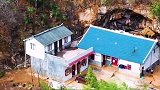 贵州大山里的独户人家，把房子盖在山洞门口，拥有超级储物室