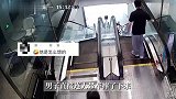 男子骑自行车下自动扶梯，结果连人带车摔下楼梯