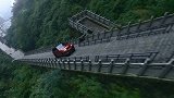 路虎揽运混动版的性能压榨！挑战天门山的99个发夹弯