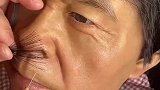 我龇牙咧嘴地看了一会儿，原来栽胡子的是个假人，现在的造假技术实在是太高