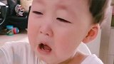 宝贝哭了，看起来好委屈