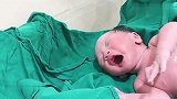刚出生5分钟的小宝宝，白净有肉，哭声响亮，真招人喜欢！