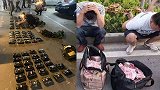 实拍荆州警方地下停车场抓捕毒贩 71.8公斤毒品堆成小山