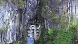 贵州大山崖壁发现一山洞，洞中竟有一座五层楼，还有两个空调