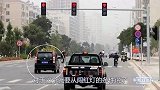 黄灯最后一秒过线，继续走算闯红灯？还是该停车？交警告诉你真相