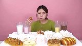 美女试吃花式奶油面包、甜酥面包、黄油面包、芝士挞、4种牛奶