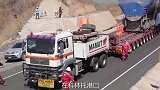 两台350吨发动机用卡车运输156公里要用7天！