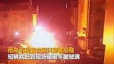 凌晨小区内大货车起火 特警砸窗开着“火车”直奔消防栓