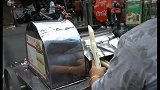 越南路边，冰镇甘蔗汁，当场鲜榨