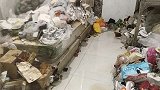 24岁女子租房一年屋里堆满垃圾 房东：装了100多袋