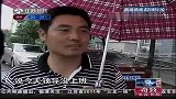 南京市区普降暴雨 小区围墙坍塌连砸9车-6月26日