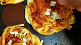 用挂面做的鸟巢鸡蛋小煎饼，色泽金黄，味道超好