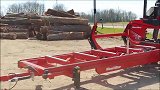 德国制造的双轨便携式锯木机械，能将一棵树轻松变木板