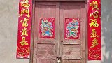 为什么农村家家户户的大门外都挂个镜子呀