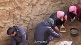 专家挖开两千年古墓，尸体保存完好，皮肤仍有弹性，轰动中外