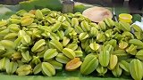 印度小贩卖杨桃的手法还是第一次见呢,感觉特好吃的!