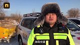 哈尔滨大雪路结冰,SUV用绳拉货车跑