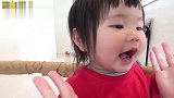 小宝宝狠憋一口气，眼睛瞪得圆圆的，这要和谁拼命