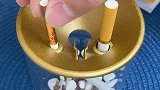 漏斗设计的烟灰缸，烟灰不会到处乱飞，看着也上档次，快给你老公也安排一个吧上热门