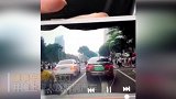 广州一轿车闯红灯并撞上行人及两辆车 已致13伤