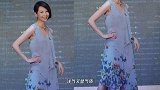 蔡少芬真是个时髦精，穿吊带纱裙配蝴蝶项链，短发洋气又显气质
