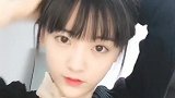 给大家表演一个15秒钟扎丸子头
