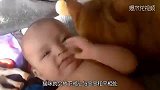 好暖啊！大肥猫第一次见到宝宝，竟然紧紧搂住宝宝！