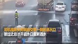 江西洒水车作业遇执勤交警关闭单侧喷水交警敬礼致谢