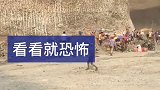 缅甸矿口，这么高的矿山他们也不怕塌了，你敢在下面待着吗