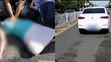 湖南一女司机斑马线上撞倒两人 穿着高跟鞋当场下跪痛哭
