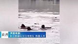 武汉女子捡手机坠江靠羽绒服漂浮，救援队员冬泳时发现救起