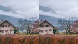 瑞士阿尔卑斯山下的小镇，远处烟雾缭绕，好想住在这样的小木屋里
