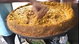 这是印度人非常喜欢吃的街头食物,怎么样我认为一般人吃不下它.