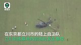 日本自卫队训练出事故 直升机“硬着陆”摔成两截