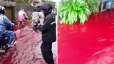 印尼：洪水袭击蜡染工厂，染料流出染红村庄