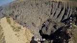 地理中国：新疆准噶尔盆地奎屯河大峡谷崖壁上为何有许多藏金洞？
