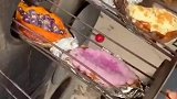 现在外面的烤红薯都卷成这样了