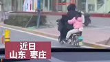 电动车没电小可爱卖力猛蹬，一看就是家里的顶梁柱
