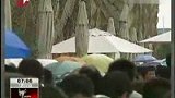 下雨难挡游客参观热情 世博雨伞热销-7月12日