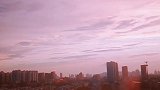 莫道桑榆晚为霞尚满天。（暴雨后城市的天空）