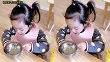 杨威晒女儿吃饭视频，萌娃左手握勺专心进食超可爱