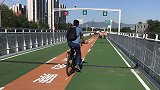 告别挤地铁！北京首条自行车专用路开通 回龙观到上地仅26分钟