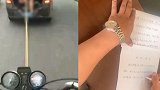 男子坐后备箱拖拽摩托车拍视频炫耀 交警：写检讨 罚款250元