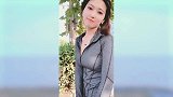 户外运动装美女，微胖的身材有气质，微笑起来真甜美