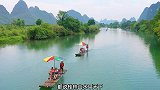 去桂林旅游一定要去阳朔遇龙河坐一次竹筏，感受一下小学语文课本