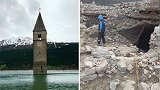 意大利：被淹没71年的村庄重见天日，诡异塔楼矗立在水中