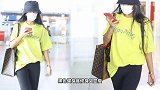 吉克隽逸机场玩转撞色搭配，一条健美裤穿出女团腿，时髦又高级
